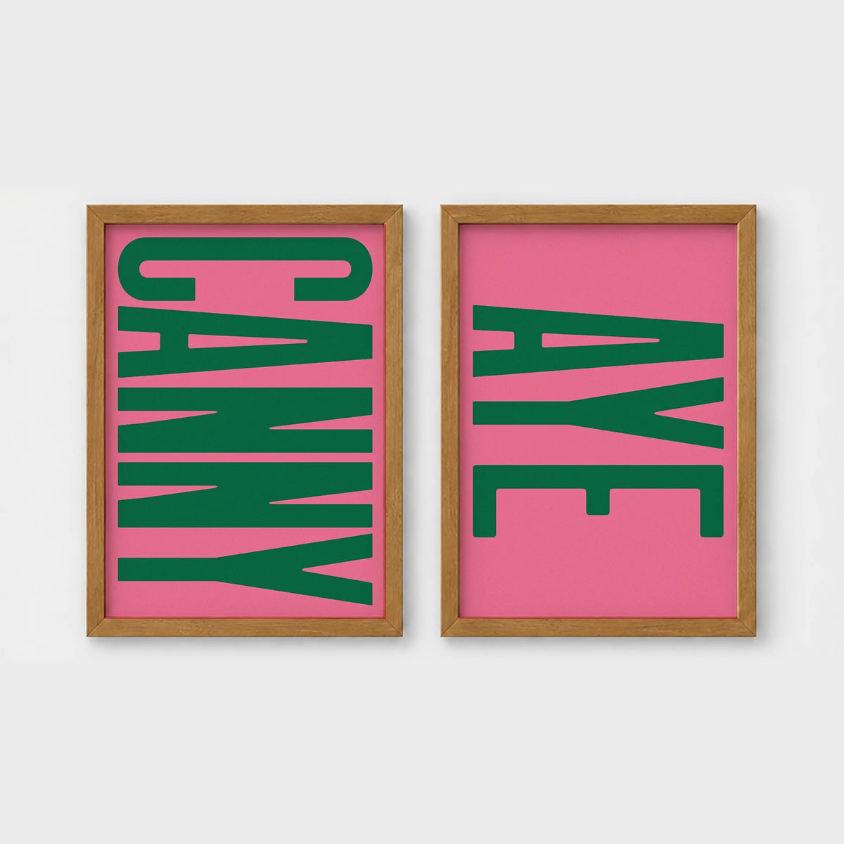Set of 2 framed prints, Newcastle & Geordie dialect prints: the word "Canny" in bold green retro type on pink; and the word "Aye" in bold green retro type on pink — unframed