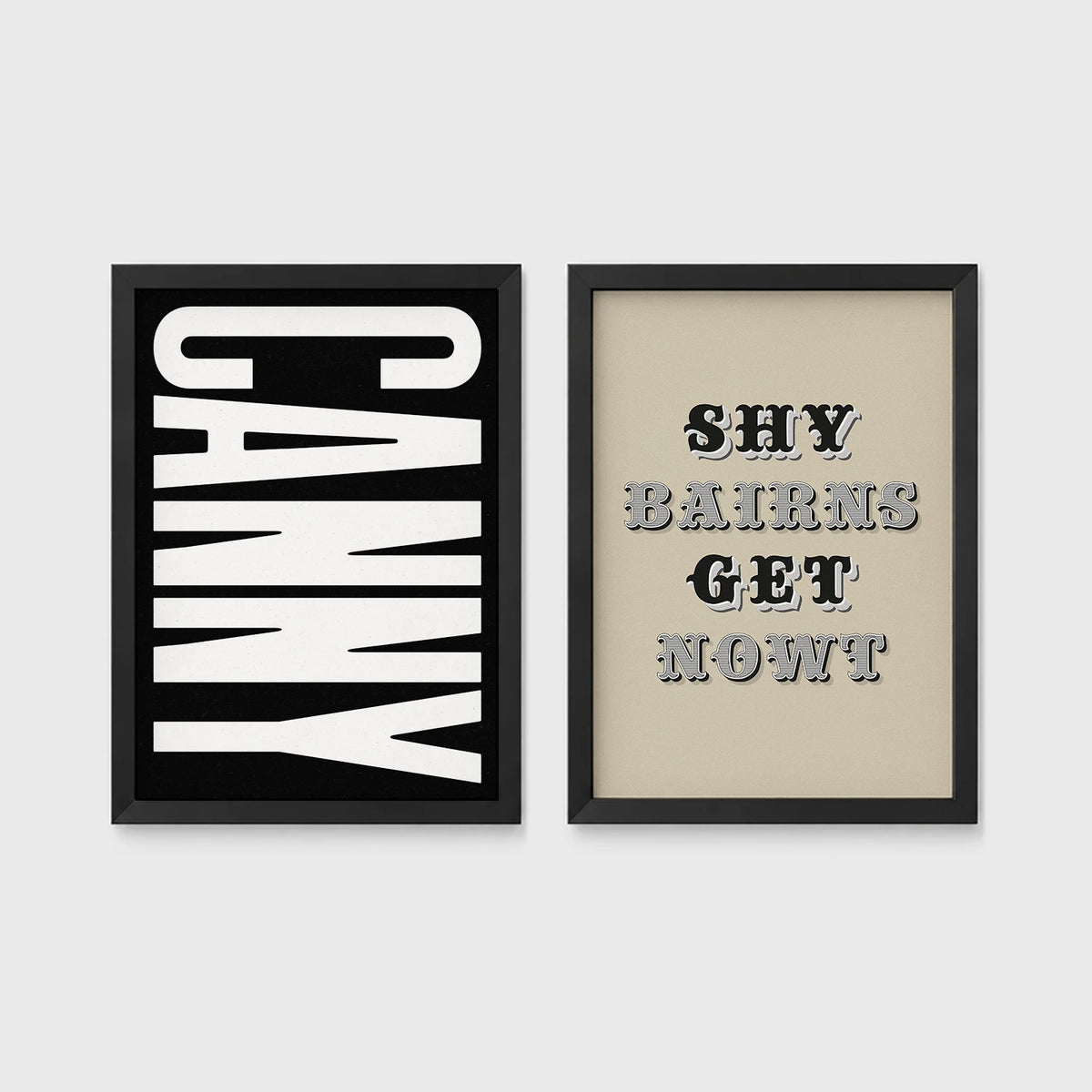 Set of 2 framed prints, Newcastle & Geordie dialect prints (black & white): the word "Canny" in bold black and white type; and the Geordie slogan "Shy Bairns Get Nowt" in bold black and white type — unframed