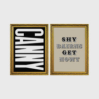 Set of 2 framed prints, Newcastle & Geordie dialect prints (black & white): the word "Canny" in bold black and white type; and the Geordie slogan "Shy Bairns Get Nowt" in bold black and white type — unframed
