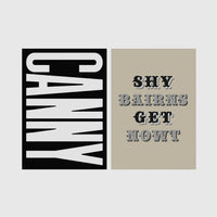 Set of 2 framed prints, Newcastle & Geordie dialect prints (black & white): the word "Canny" in bold black and white type; and the Geordie slogan "Shy Bairns Get Nowt" in bold black and white type — unframed