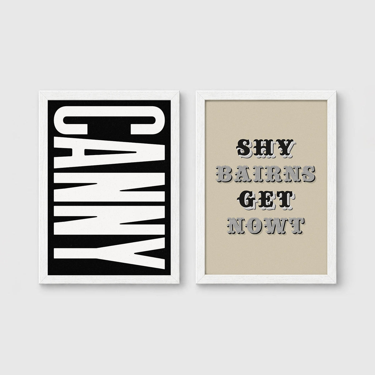 Set of 2 framed prints, Newcastle & Geordie dialect prints (black & white): the word "Canny" in bold black and white type; and the Geordie slogan "Shy Bairns Get Nowt" in bold black and white type — unframed