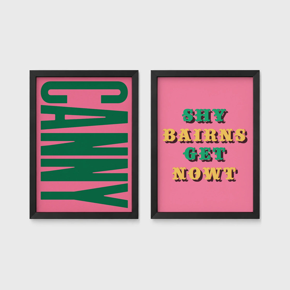 Set of 2 framed prints, Newcastle & Geordie dialect prints: the word "Canny" in bold green retro type on pink; and the Geordie slogan "Shy Bairns Get Nowt" in bold retro type on pink — unframed