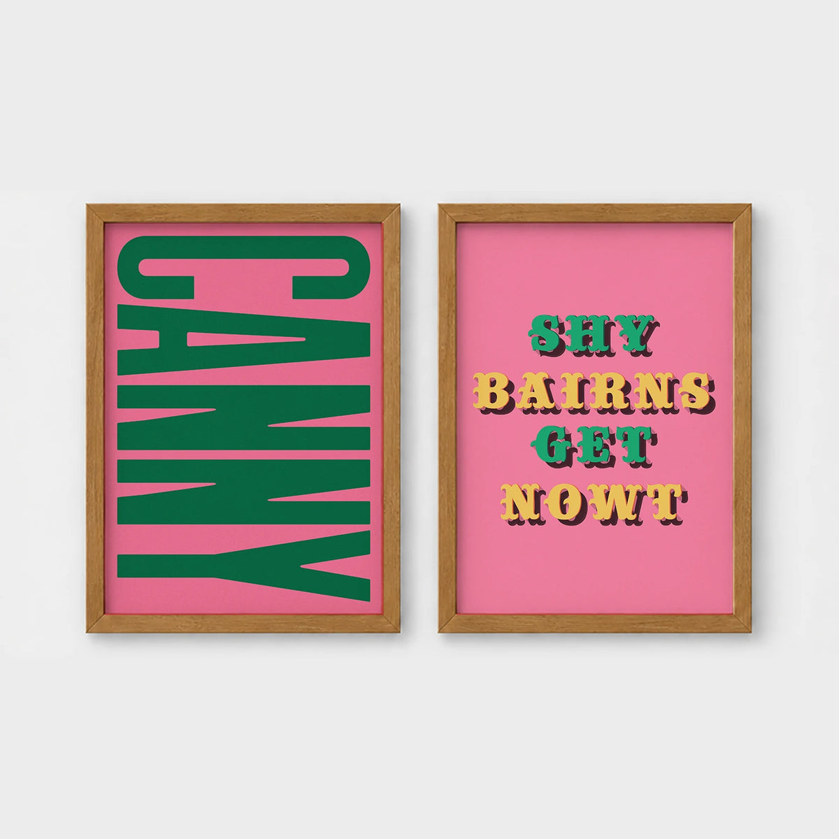 Set of 2 framed prints, Newcastle & Geordie dialect prints: the word "Canny" in bold green retro type on pink; and the Geordie slogan "Shy Bairns Get Nowt" in bold retro type on pink — unframed