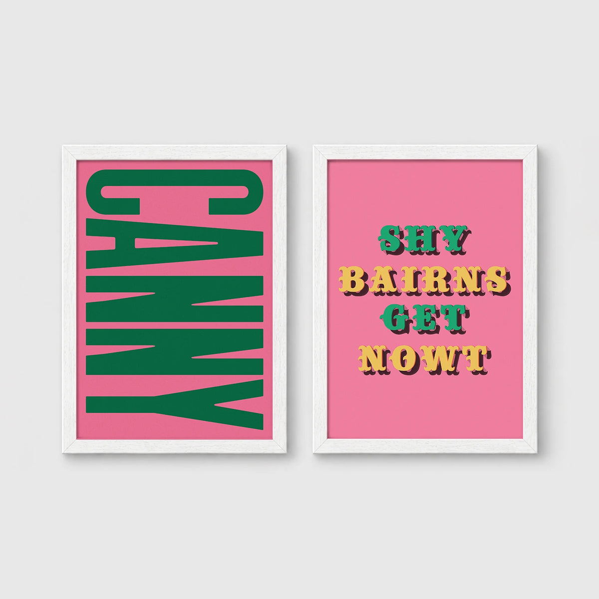 Set of 2 framed prints, Newcastle & Geordie dialect prints: the word "Canny" in bold green retro type on pink; and the Geordie slogan "Shy Bairns Get Nowt" in bold retro type on pink — unframed