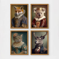 Set of 4 framed prints, animals in period noble dress: a fox in an Elizabethan ruff collar; a koala wearing a crown and royal robe; a tabby cat in a Renaissance lady's dress; and a stag in a blue military uniform — unframed