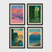 Set of 4 framed prints, Kawase Hasui Japanese woodblock prints: pink sunset over ocean waves and cliffs; a cedar forest path with a lone walker; boats moored on a canal at dawn beneath a cloud-streaked sky; and Mount Fuji glowing red at sunset, reflected in the water — unframed