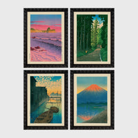 Set of 4 framed prints, Kawase Hasui Japanese woodblock prints: pink sunset over ocean waves and cliffs; a cedar forest path with a lone walker; boats moored on a canal at dawn beneath a cloud-streaked sky; and Mount Fuji glowing red at sunset, reflected in the water — unframed