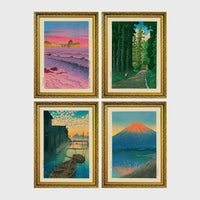 Set of 4 framed prints, Kawase Hasui Japanese woodblock prints: pink sunset over ocean waves and cliffs; a cedar forest path with a lone walker; boats moored on a canal at dawn beneath a cloud-streaked sky; and Mount Fuji glowing red at sunset, reflected in the water — unframed