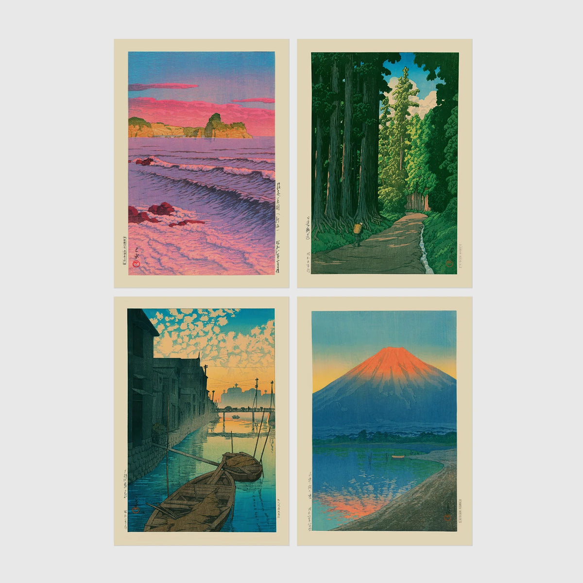 Set of 4 framed prints, Kawase Hasui Japanese woodblock prints: pink sunset over ocean waves and cliffs; a cedar forest path with a lone walker; boats moored on a canal at dawn beneath a cloud-streaked sky; and Mount Fuji glowing red at sunset, reflected in the water — unframed