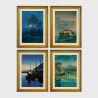 Set of 4 framed prints, Kawase Hasui Japanese woodblock prints (night scenes): a moonlit tree and stone lantern at night; a misty rain-soaked house with lantern light at dusk; sailboats moored at a harbour at dawn; and a canal bridge scene with a figure and umbrella at twilight — unframed
