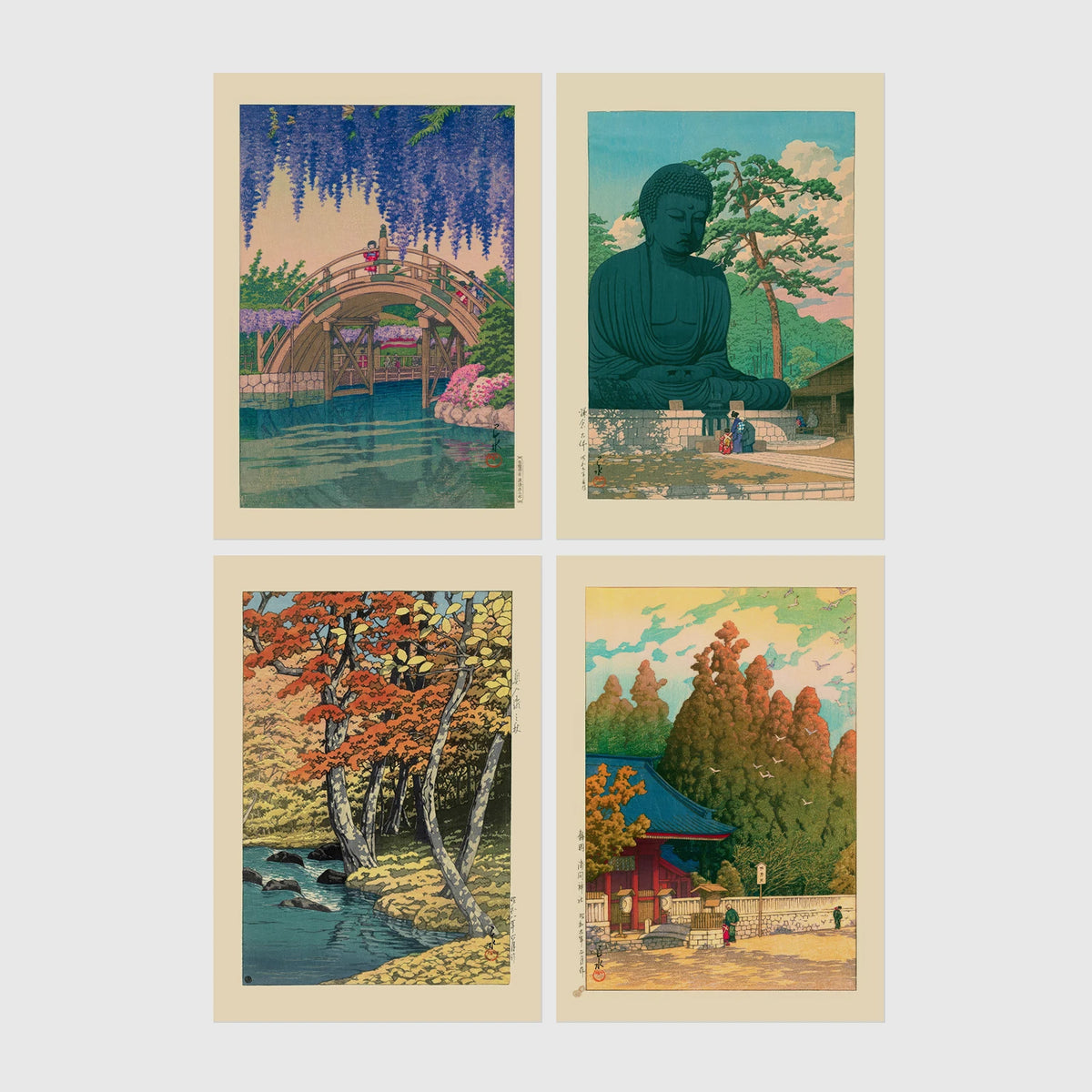 Set of 4 framed prints, Kawase Hasui Japanese woodblock prints (landmarks): a red arched bridge beneath cascading wisteria and cherry blossom; the Great Buddha of Kamakura among pine trees; a stream through autumn foliage; and a red pagoda gate in an autumn forest — unframed