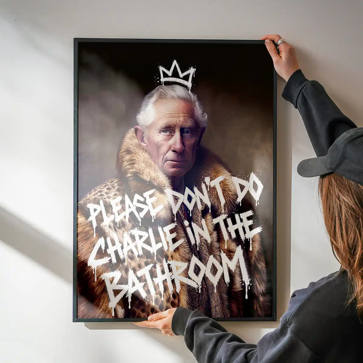 Don't Do Charlie King Charles bathroom print framed and displayed in a modern interior