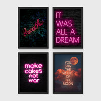 Set of 4 framed prints, pink typographic quote prints: "Let's Stay Home" bold retro typography; a peace-sign hand illustration filled with uplifting text; "This Kitchen Is For Dancing" bold retro typography; and a second peace-sign hand illustration filled with uplifting text — unframed