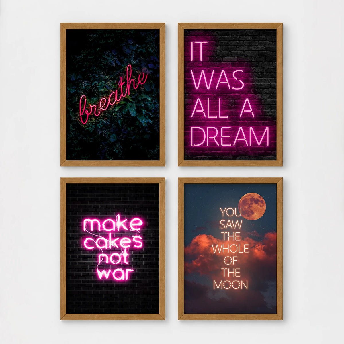 Set of 4 framed prints, pink typographic quote prints: "Let's Stay Home" bold retro typography; a peace-sign hand illustration filled with uplifting text; "This Kitchen Is For Dancing" bold retro typography; and a second peace-sign hand illustration filled with uplifting text — unframed