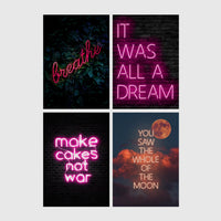 Set of 4 framed prints, pink typographic quote prints: "Let's Stay Home" bold retro typography; a peace-sign hand illustration filled with uplifting text; "This Kitchen Is For Dancing" bold retro typography; and a second peace-sign hand illustration filled with uplifting text — unframed