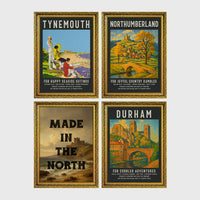 Set of 4 framed prints, vintage North East England travel posters: a "Tynemouth - For Happy Seaside Outings" vintage travel poster; a "Northumberland - For Joyful Country Rambles" vintage travel poster; "Made in the North" over a coastal castle landscape; and a "Durham - For Cobbled Adventures" vintage travel poster — unframed