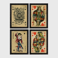 Set of 4 framed prints, French-style illustrated floral posters: "Fleurs et Feuilles" abstract flower vase illustration; "Galerie de Fleurs" illustration of a woman with flowers; "Le Jardin" wildflower garden illustration; and "Saison du Marché" pink flower illustration — unframed