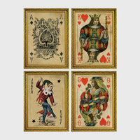 Set of 4 framed prints, French-style illustrated floral posters: "Fleurs et Feuilles" abstract flower vase illustration; "Galerie de Fleurs" illustration of a woman with flowers; "Le Jardin" wildflower garden illustration; and "Saison du Marché" pink flower illustration — unframed