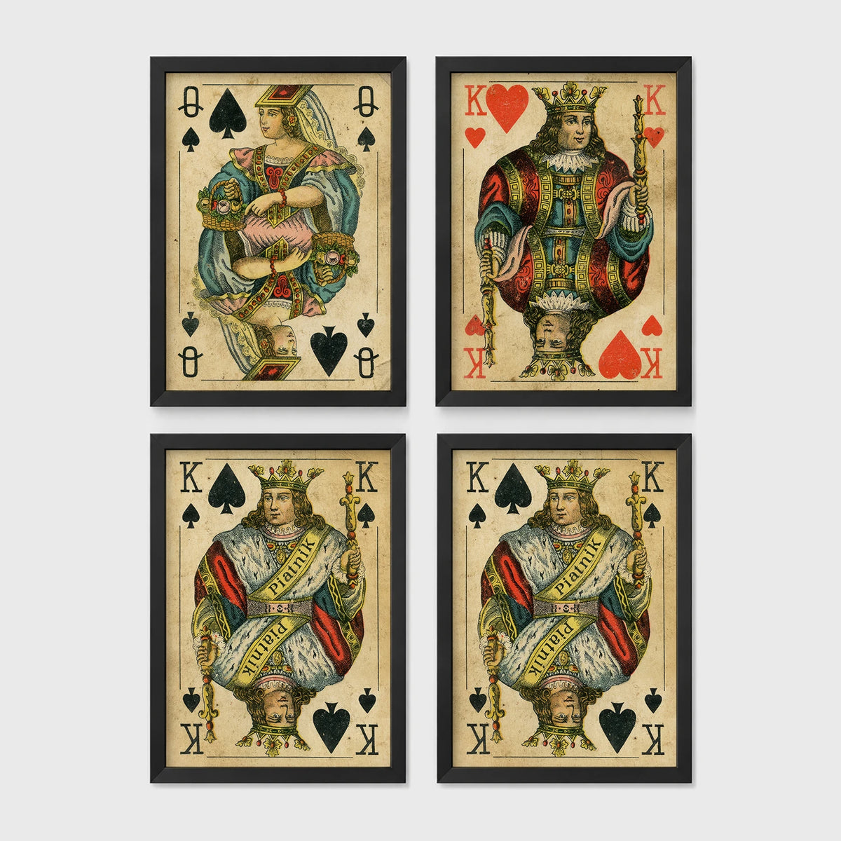 Set of 4 framed prints, vintage oversized playing cards: an Ace of Spades; a King of Hearts; a Joker; and a Queen of Hearts — unframed