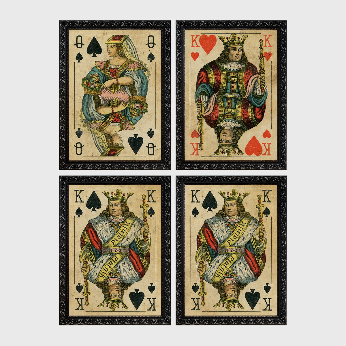 Set of 4 framed prints, vintage oversized playing cards: an Ace of Spades; a King of Hearts; a Joker; and a Queen of Hearts — unframed