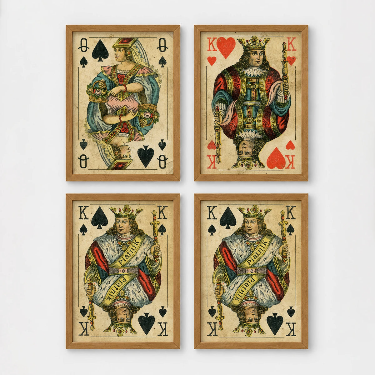Set of 4 framed prints, vintage oversized playing cards: an Ace of Spades; a King of Hearts; a Joker; and a Queen of Hearts — unframed