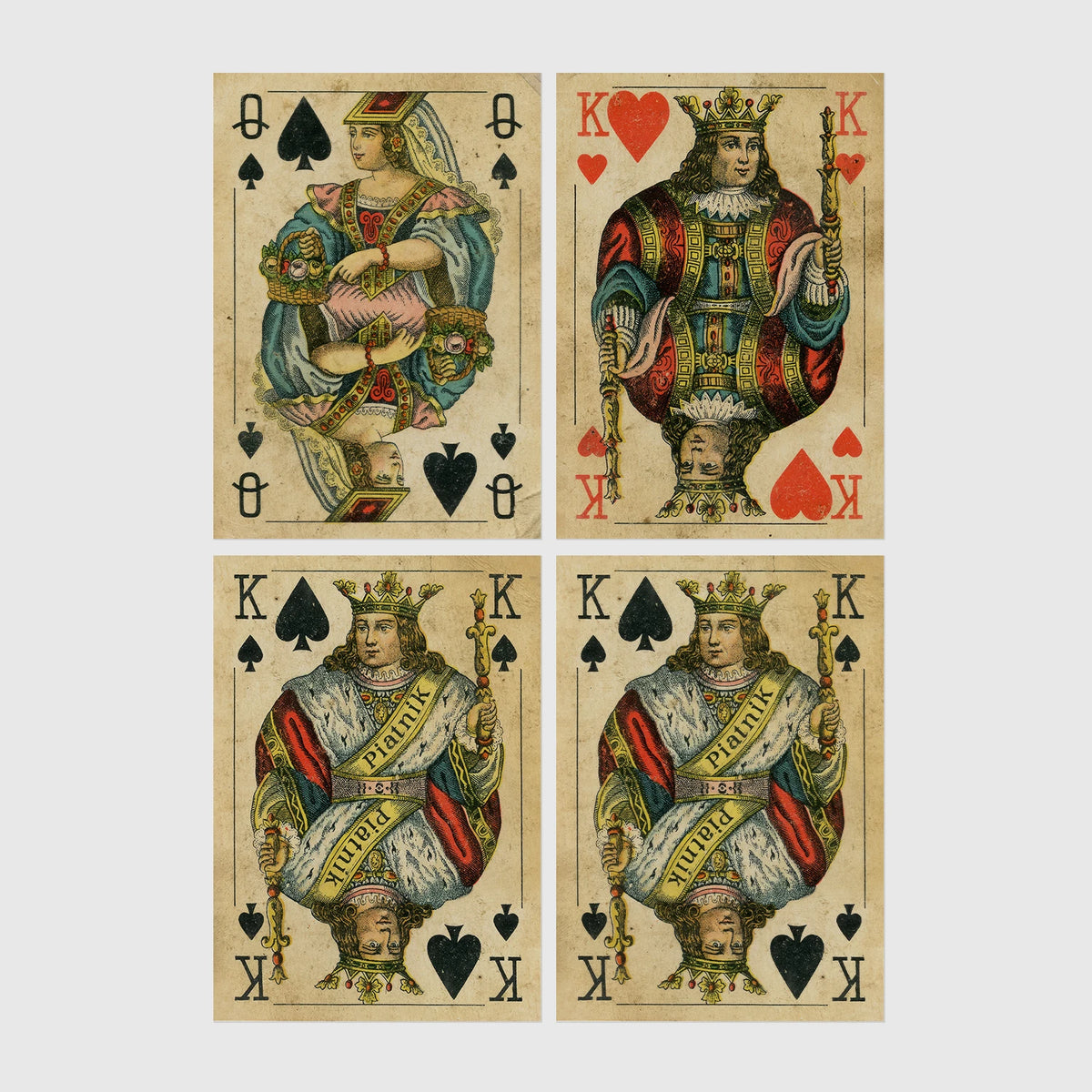 Set of 4 framed prints, vintage oversized playing cards: an Ace of Spades; a King of Hearts; a Joker; and a Queen of Hearts — unframed