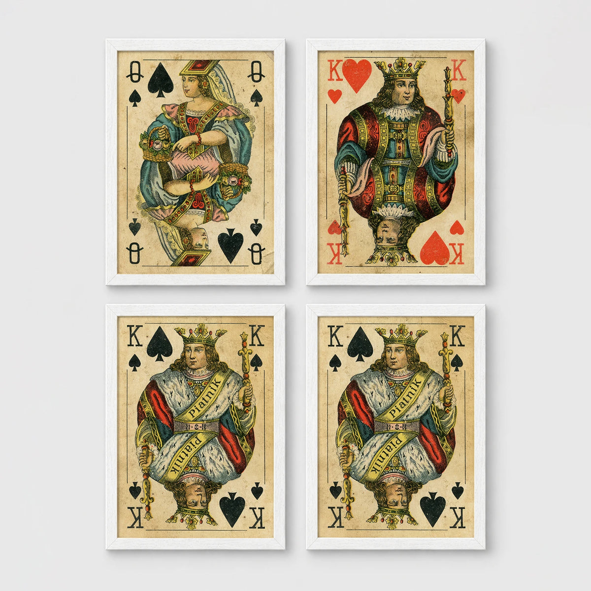 Set of 4 framed prints, vintage oversized playing cards: an Ace of Spades; a King of Hearts; a Joker; and a Queen of Hearts — unframed