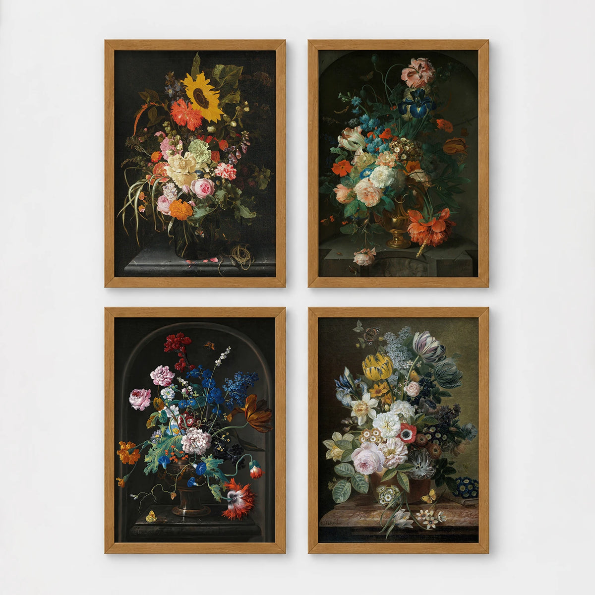 Set of 4 framed prints, classic Dutch-style floral still life paintings: a bouquet with sunflowers and roses against a dark background; flowers in an urn set in a stone alcove; flowers in a pot set in a stone alcove; and a floral arrangement on a wooden ledge — unframed