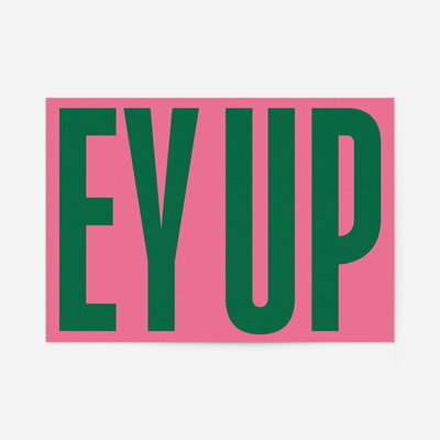 Ey Up bold typography print with huge dark green capital letters on a pink background, landscape