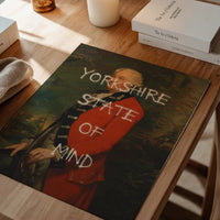 Altered art portrait print displayed in a dining room