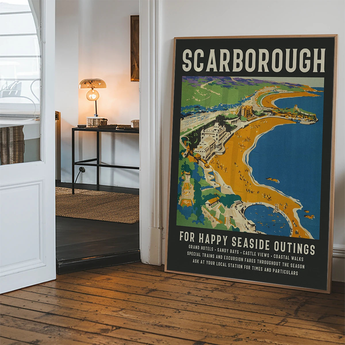 Vintage Scarborough seaside poster hanging in a hallway