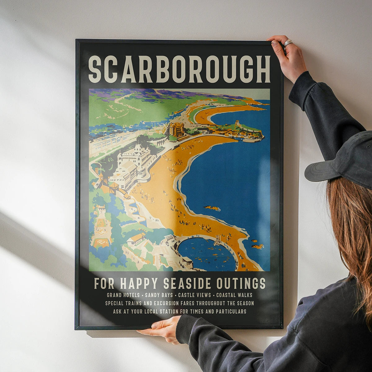 The retro coastal print displayed in a kitchen