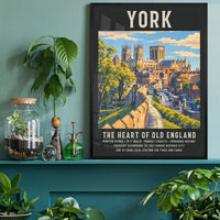 Framed York Minster travel poster print above a desk in a home office