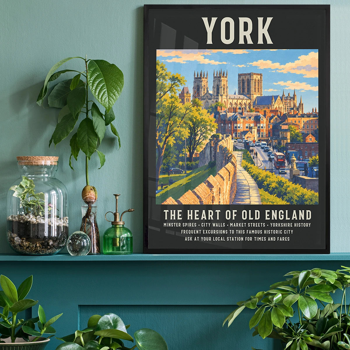 Framed York Minster travel poster print above a desk in a home office