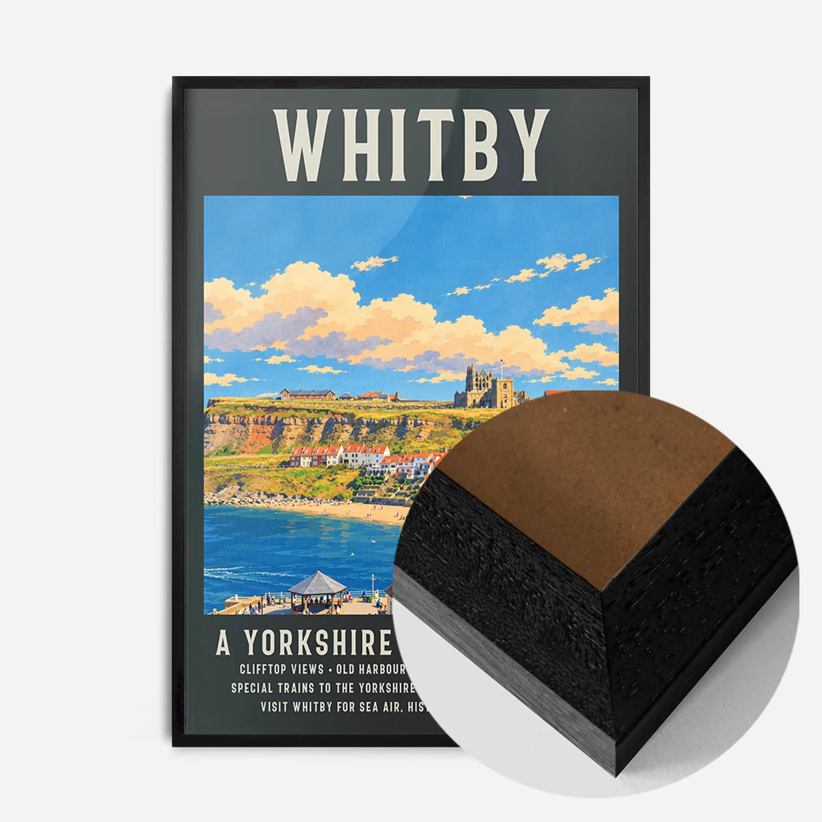 Whitby harbour travel poster print in a black wood frame, side profile