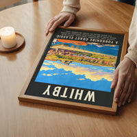 Vintage seaside Whitby print on a bedroom wall, portrait format with sunny coastal scene