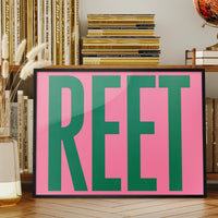 Reet typography print in a landscape frame on a living room wall