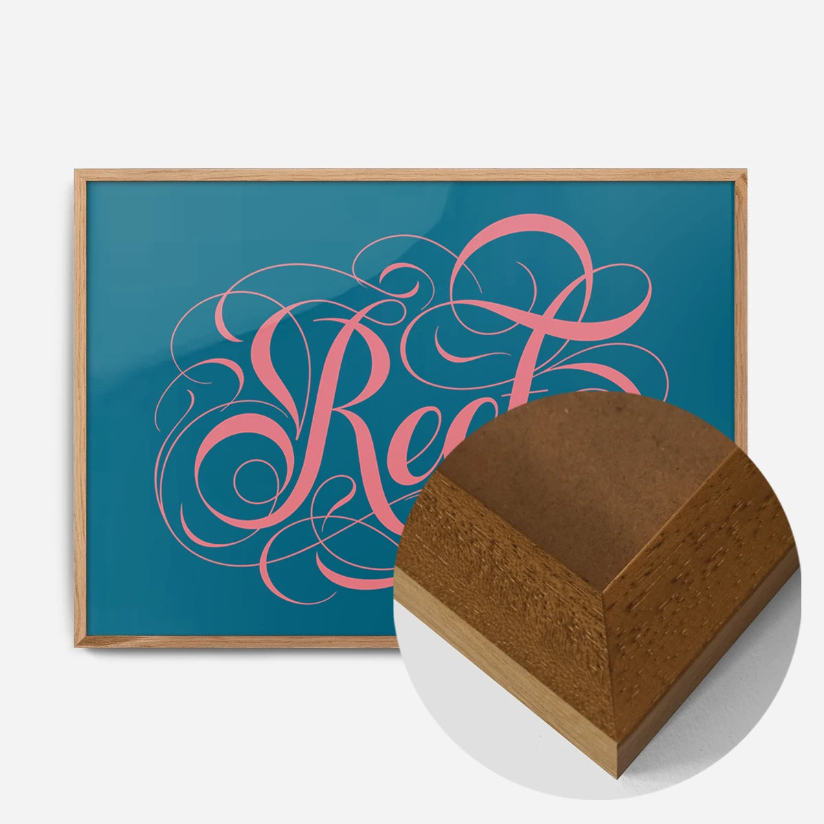 swirly calligraphy lettering print in an oak wood frame, side profile
