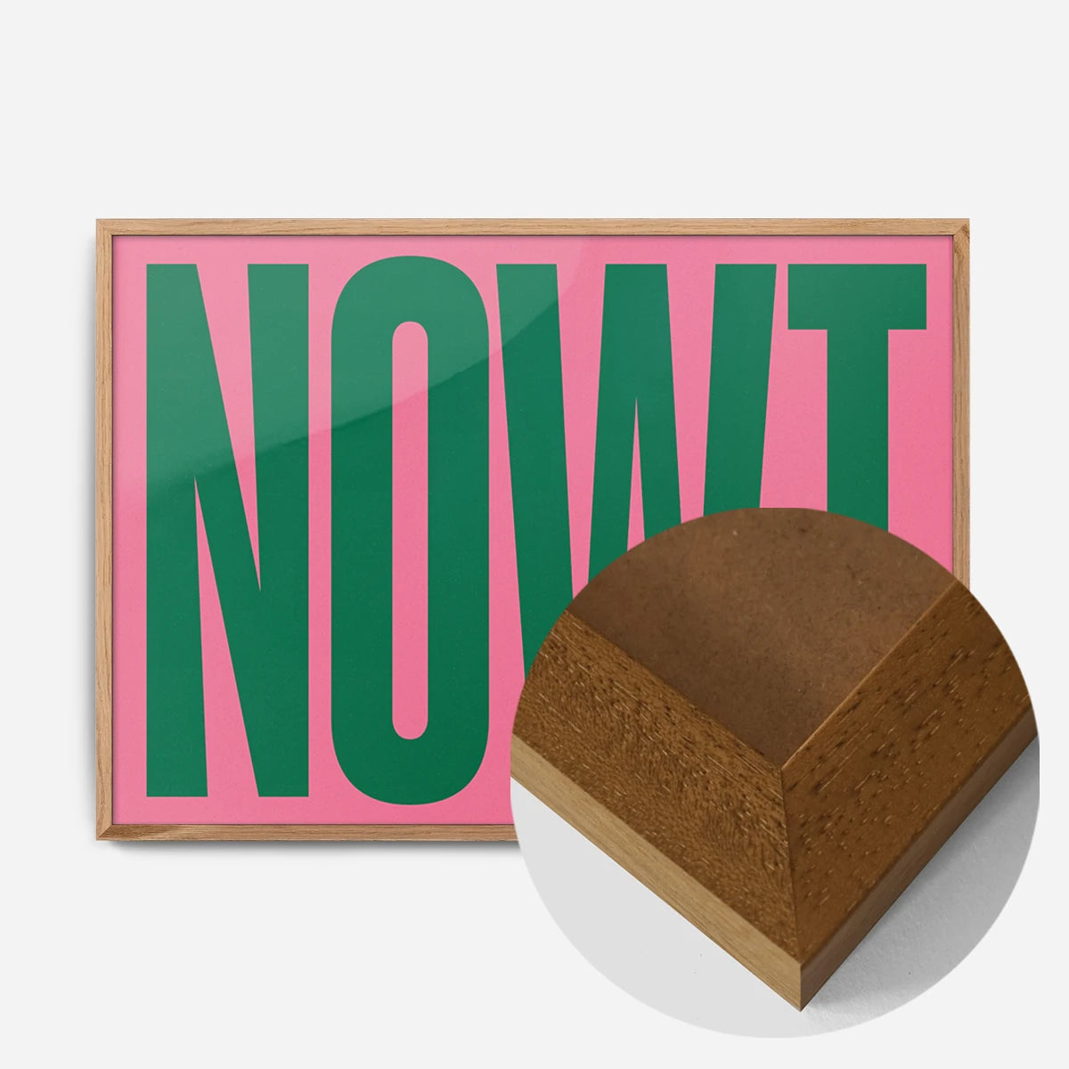 bold green nowt typography print in an oak wood frame, side profile