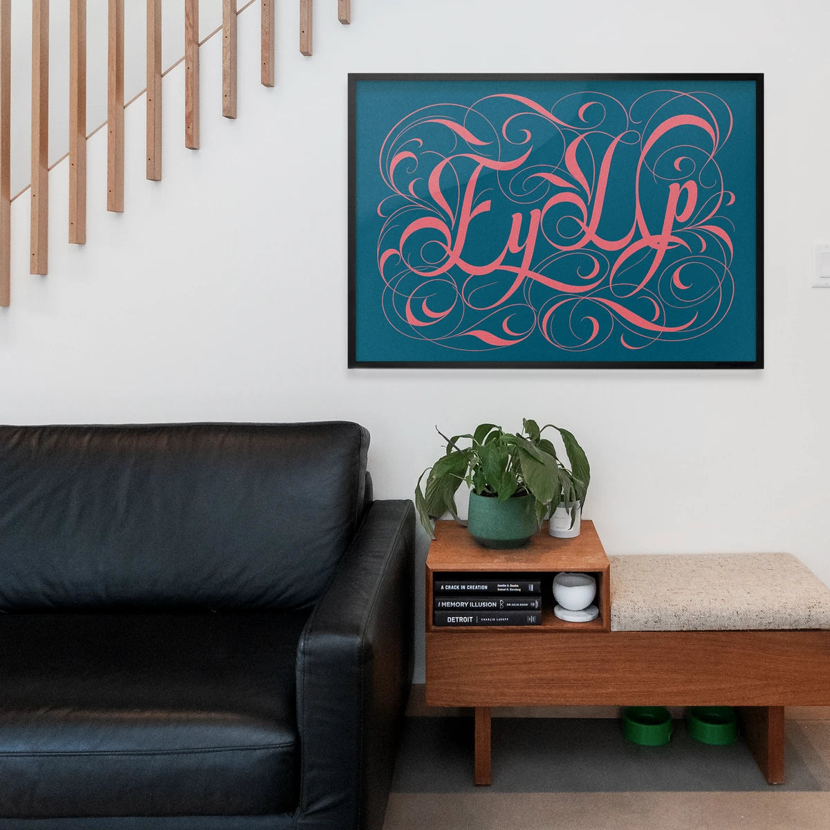 Ey Up calligraphy wall art styled in a home office
