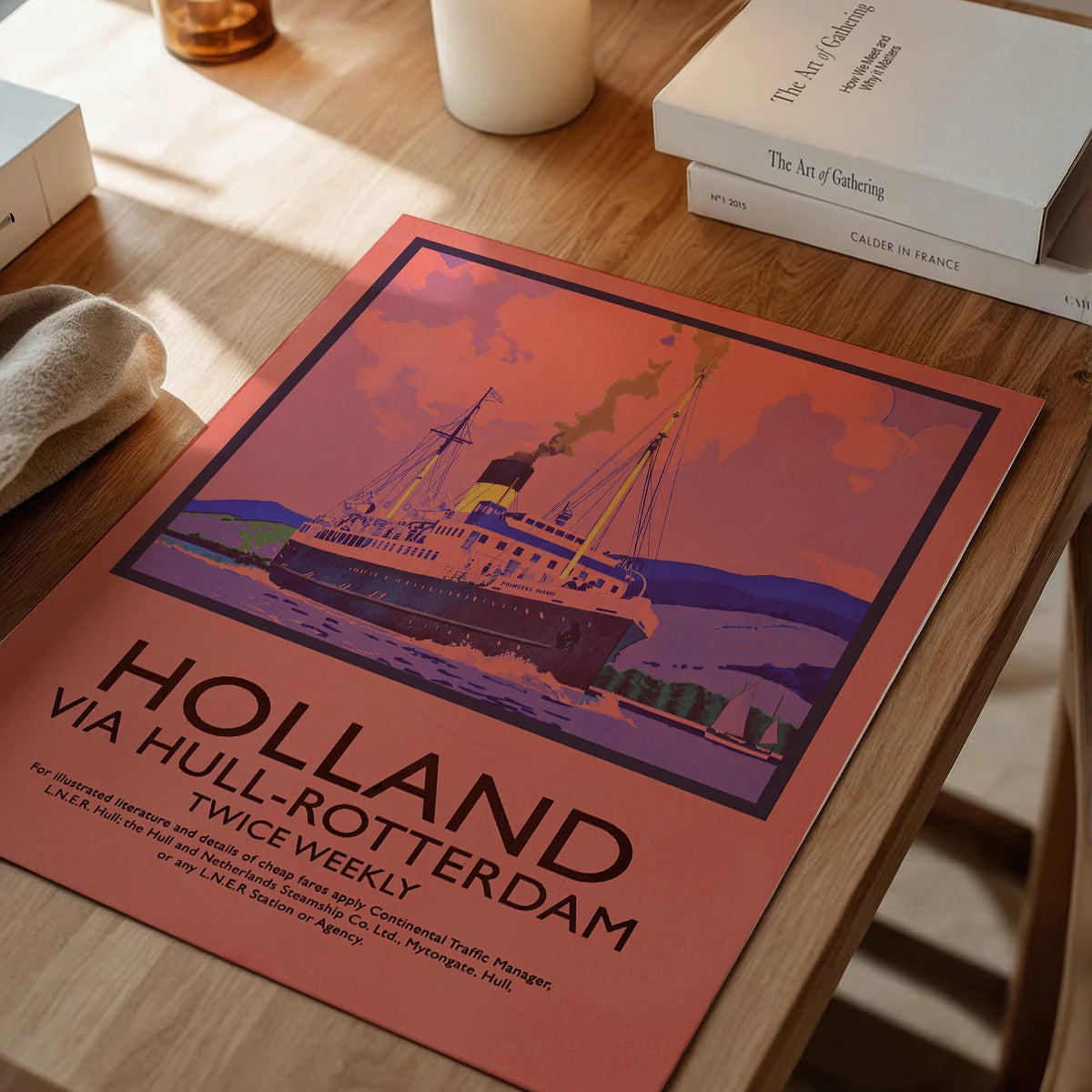 Nautical steamship wall art displayed in a dining room