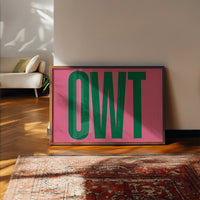 Green and pink typography print on a kitchen wall as a cheerful focal point