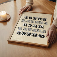 The print in a bedroom, ornate black and grey lettering on a warm stone background