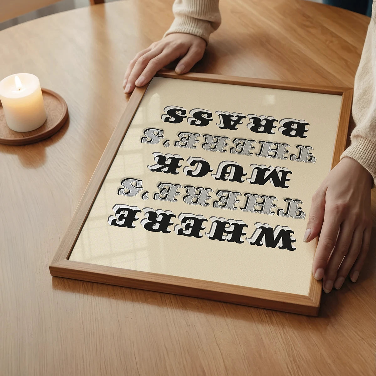The print in a bedroom, ornate black and grey lettering on a warm stone background