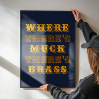 Golden typography quote art hung in a kitchen
