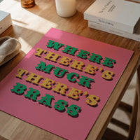 Pink and green typography print on a dining room wall adding retro character